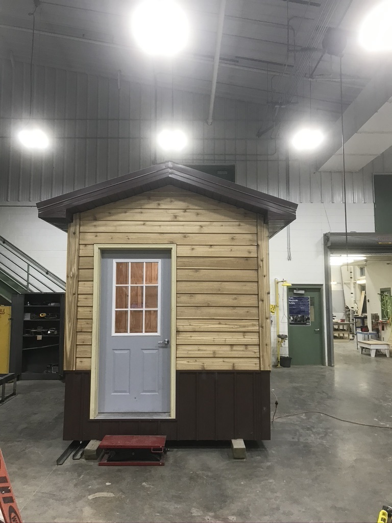 Sauna front 32" exterior door, 6 " lap cedar siding